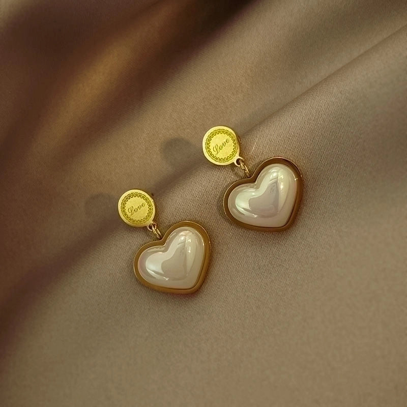 Orecchino cuore di perla