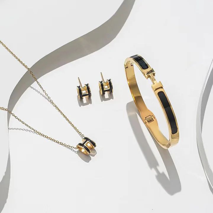 Set collana + orecchino + bracciale